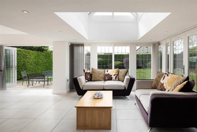 A lantern ceiling allows lots of natural light and the room leads out onto the south facing garden via bi-fold doors