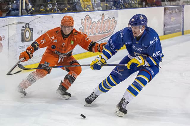 SHeffield Steeldogs v Leeds KnightsSteeldogs Nathan Ripley with Knights Sam Dunn.  Photograph by Tony Johnson.  31st December 2025.