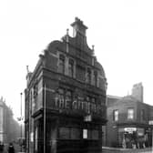 The City public house and restaurant, located on Woodhouse Lane between Wormald Row, left and De Grey Street. Maria H. Deacon was the licensee at the time. Pictured in March 1933.