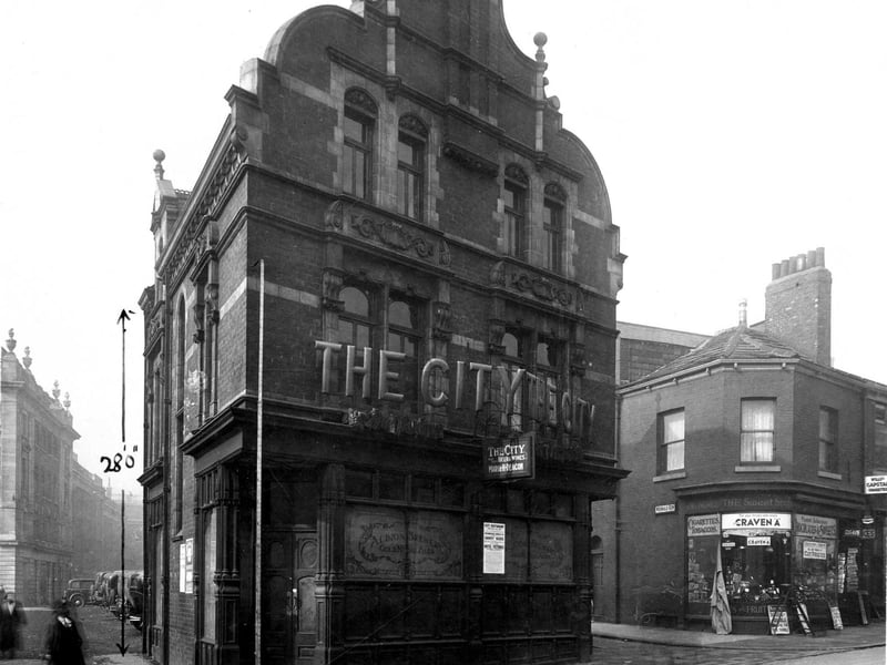The City public house and restaurant, located on Woodhouse Lane between Wormald Row, left and De Grey Street. Maria H. Deacon was the licensee at the time. Pictured in March 1933.