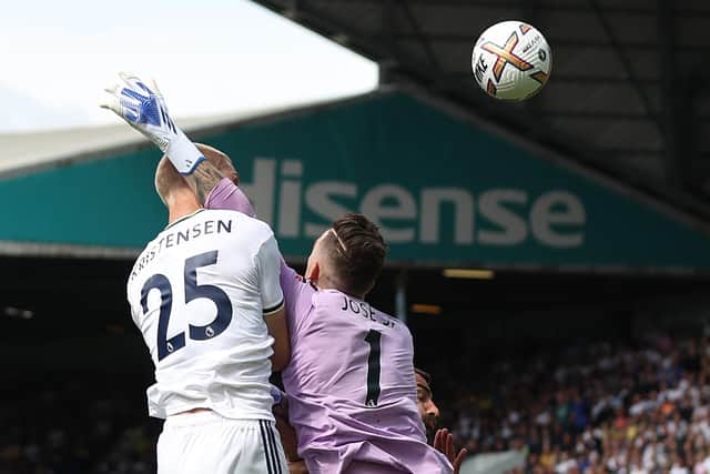 Jose Sa of Wolverhampton Wanderers collides with Rasmus Kristensen of Leeds United  during the Premier League match between Leeds United and Wolverhampton Wanderers at Elland Road on August 06, 2022 in Leeds, England. (Photo by Marc Atkins/Getty Images)