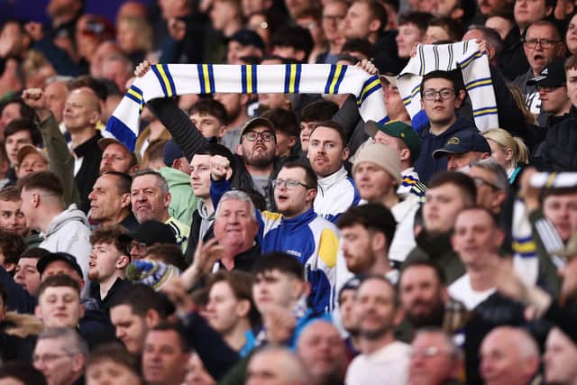 LEEDS, ENGLAND - APRIL 17: Leeds United fans show their support during the Premier League match between Leeds United and Liverpool FC at Elland Road on April 17, 2023 in Leeds, England. (Photo by Naomi Baker/Getty Images)