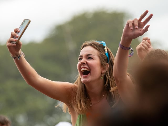 A fan captures the action