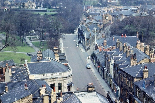 A view looking north along Queen Street from the tower of Morley Town Hall which includes a substantial part of the town. The roof at the very bottom of the picture is that of Lloyd's Bank which is still standing. All the other roofs on this side of the road as far as the park have been cleared away and replaced by the Queen's Court complex of flats and shops. Pictured in April 1965.