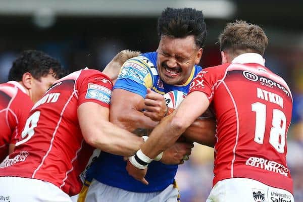 Zane Tetevano is tackled by Salford's Jack Ormondroyd and Chris Atkin. Picture by Matt West/SWpix.com.