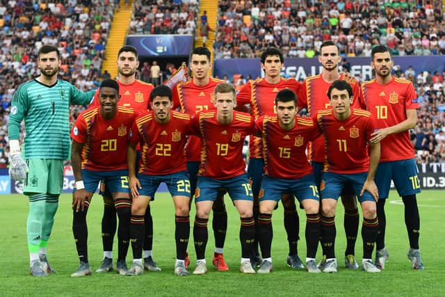 (From L, Front) Spain's defender Junior Firpo, Spain's midfielder Pablo Fornals, Spain's forward Dani Olmo, Spain's defender Martin Aguirregabiria and Spain's midfielder Mikel Oyarzabal and (From L, Rear) Spain's goalkeeper Antonio Sivera, Spain's defender Unai Nunez, Spain's defender Marc Roca, Spain's defender Jesus Vallejo, Spain's midfielder Fabian Ruiz and Spain's midfielder Dani Ceballos pose for a team photo prior to the final match of the UEFA U21 European Football Championships between Spain and Germany on June 30, 2019 at the Friuli stadium in Udine. (Photo by Miguel MEDINA / AFP)        (Photo credit should read MIGUEL MEDINA/AFP via Getty Images)