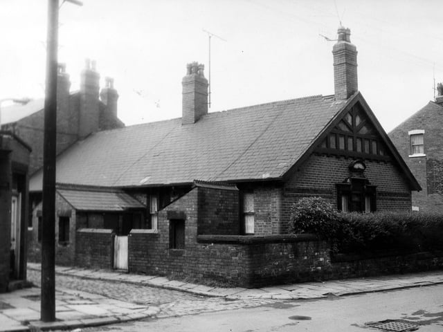 Yarm Place in June 1973 The rear entrances and yards of one storey through terraced properties numbers 50 and 52 Cambrian Road. Located in each yard is an outside toilet. In the foreground is St Luke's Road.