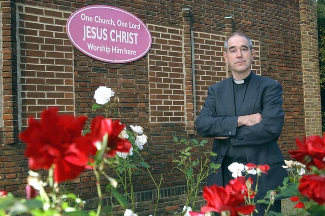 The Reverend Neil Bishop outside St Andrew's Methodist Church in October 2003.