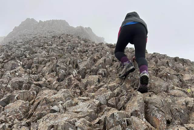 The youngster climbing the peak at one of its steepest points