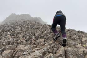 The youngster climbing the peak at one of its steepest points