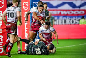 Tom Forber celebrates scoring for Wigan Warriors against Leigh Leopards last month. Picture by Bruce Rollinson/SWpix.com.