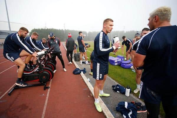 Mikolaj Oledzki, with water bottle, at England training ahead of Saturday's clash with France. Picture by Ed Sykes/SWpix.com.