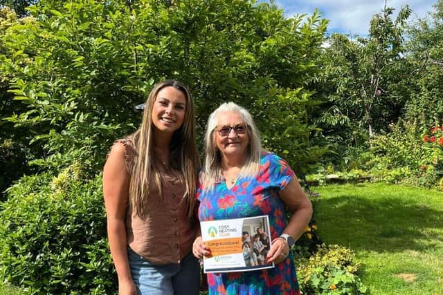 Craggs Energy’s Cosy Heating Club Winner, Gwen Commons, with her prize certificate.