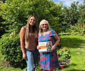 Craggs Energy’s Cosy Heating Club Winner, Gwen Commons, with her prize certificate.