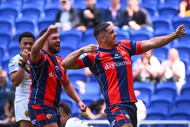 Caleb Hamlin-Uele celebrates scoring for Wakefield Trinity in their Magic Weekend drubbing of neighbours Castleford Tigers. Picture by Olly Hassell/SWpix.com.
