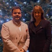 Lloyd Griffith and Rachel Reeves MP at the NSPCC's Carols by Candlelight service.