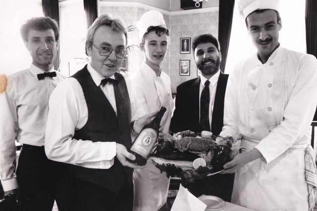 Lunch or dinner at The Olive Tree was an invitation to sample to finest Greek cuisine. For some it was a culinary adventure and for others a chance again to relish tastes first enjoyed during sun-kissed holidays. Pictured are some of the restaurant staff in October 1989, from left, Jean-Paul Amorous and Paul Reape (waiters), John Kwiatkowski (sous chef), George Psarias (owner) and Andreas Jacovou (head chef).