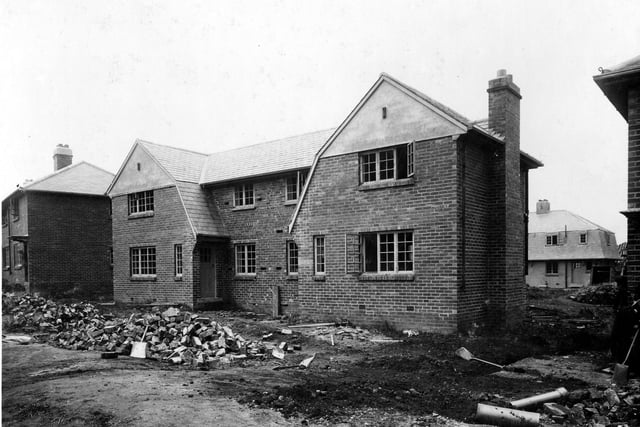 The Middleton Estate. Houses were built in various styles and sizes to accomodate the needs of tenants. In this view from July 1932. work is still in progress, building tools and materials can be seen.