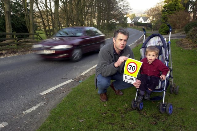 David Beckwith was campaigning for 30mph signs to be placed along Thorpe Lane in Guiseley in March 2003  to help inform motorist to slow down and not speed. He is pictured with son Harry.