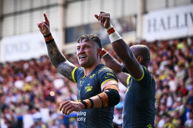 Chris Hankinson, seen celebrating his try against Warrington Wolves, has impressed Leeds Rhinos fan Becky Oxley. Picture by Olly Hassell/SWpix.com.