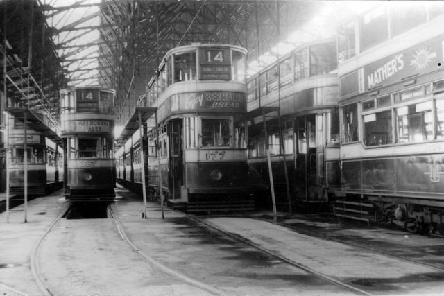 The interior of a tram depot showing several trams, including in the centre Horsfield car no. 177, which first ran in Leeds on May 30, 1931. To the left is no. 227, also a Horsfield, which first ran on October 10, 1931.