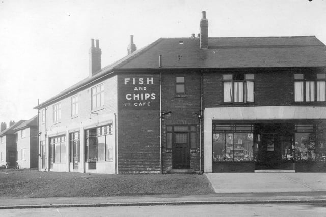 A parade of shops on the corner of Potternewton Road and Scott Hall Road in February 1931. In view is a grocers shop owned by Fred Dawson who also owns a fish and chip shop to the left.
