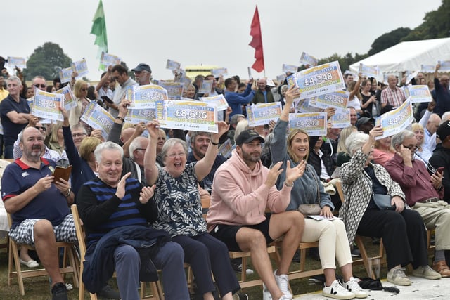 The big People’s Postcode Lottery event, which took place in Soldiers Fields, Roundhay park, saw the prize money divvied out across all players living in the LS17 6 area.