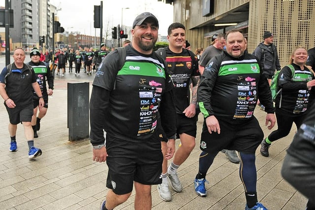 Walkers make their way up Eastgate as they head for Leeds Rhinos' Kirkstall training academy, where Milford play matches.