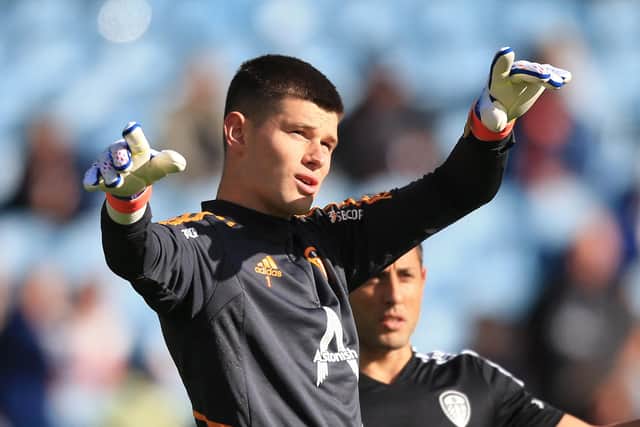 Leeds United's French goalkeeper Illan Meslier during a pre-match warm-up at Elland Road. (Photo by LINDSEY PARNABY/AFP via Getty Images)