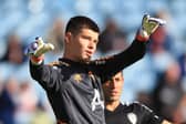 Leeds United's French goalkeeper Illan Meslier during a pre-match warm-up at Elland Road. (Photo by LINDSEY PARNABY/AFP via Getty Images)