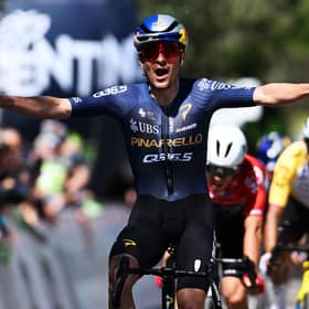 Tom Pidcock celebrates winning a stage of the Tour of the Alps earlier this yead (Picture: Tim de Waele/Getty Images)