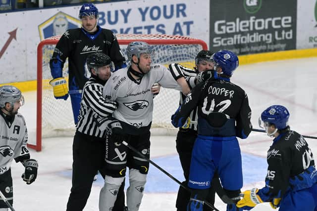 HELLO THERE: Emil Svec and Leeds Knights' Sam Cooper exchange a few words early on in Thursday night's NIHL National derby at The Castle. Picture Jonathan Gawthorpe