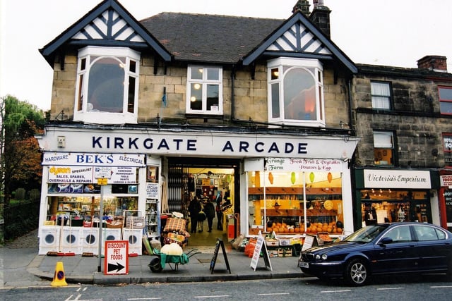 Kirkgate Arcade showing Bek's Hardware and Electrical store and Grange Farm fresh fruit and vegetables, potatoes and eggs. Victoria's Emporium is numbered 63 Kirkgate. Pictured in October2003.