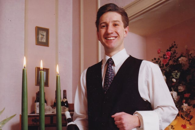 This is Andrew Platt, head waiter at Rombalds Hotel and restaurant in Ilkley, was rehearing his table manners in preparation for the Young Waiter of the Year competition fin al in London. He is pictured in April 1993.