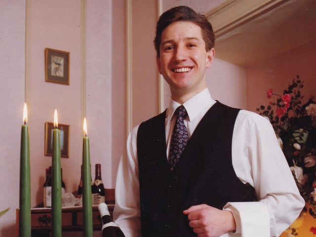 This is Andrew Platt, head waiter at Rombalds Hotel and restaurant in Ilkley, was rehearing his table manners in preparation for the Young Waiter of the Year competition fin al in London. He is pictured in April 1993.