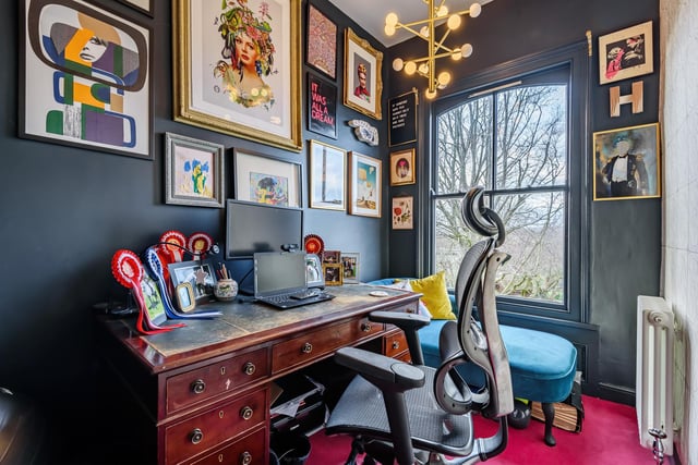 The home's study features beautiful views from the feature window.