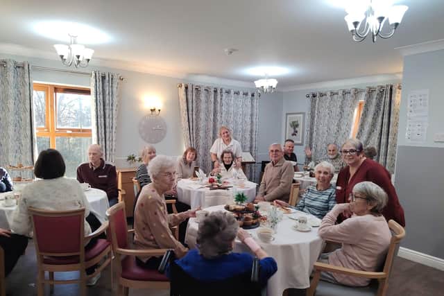 Residents, colleagues and guests at HC-One’s Snapethorpe Hall Care Home’s Christmas Community Café event