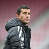 Leeds United's Spanish head coach Javi Gracia checks out the conditions ahead of the English Premier League football match between Bournemouth and Leeds United at the Vitality Stadium in Bournemouth, southern England on April 30, 2023. (Photo by Steve Bardens / AFP) / RESTRICTED TO EDITORIAL USE. No use with unauthorized audio, video, data, fixture lists, club/league logos or 'live' services. Online in-match use limited to 120 images. An additional 40 images may be used in extra time. No video emulation. Social media in-match use limited to 120 images. An additional 40 images may be used in extra time. No use in betting publications, games or single club/league/player publications. /  (Photo by STEVE BARDENS/AFP via Getty Images)