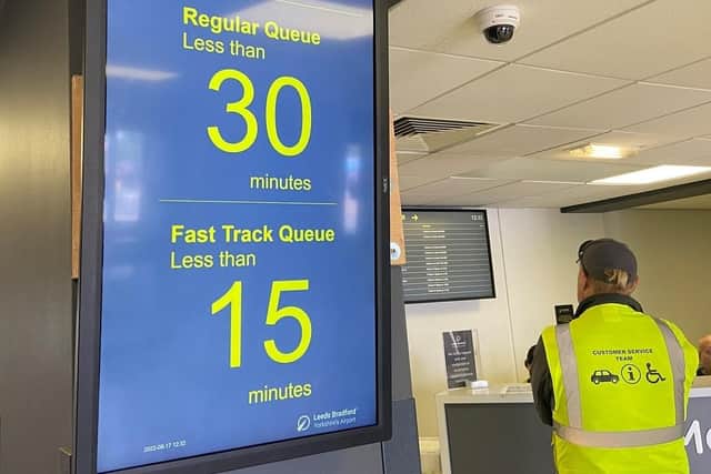 Screens showing estimated security queue times. Picture: Leeds Bradford Airport