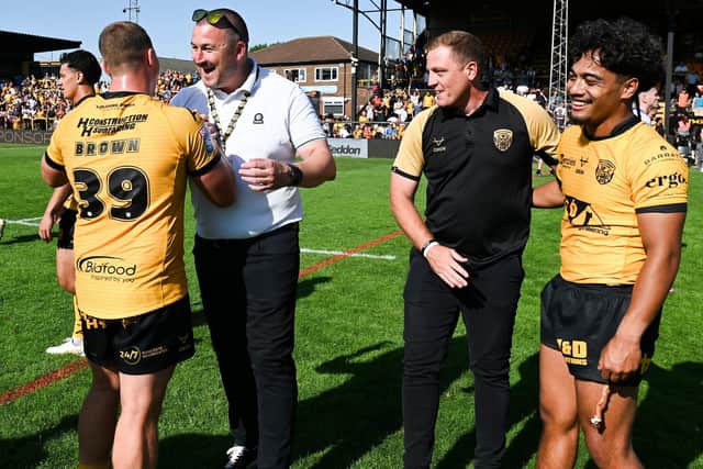 Director of rugby Chris Chester, left and coach Ryan Carr celebrate with players Jack Brown and Phoenix Laulu-Togaga'e following Castleford Tigers' win against Leeds Rhinos. A month and two days later, Carr is no longer at the club. Picture by Matthew Merrick/SWpix.com