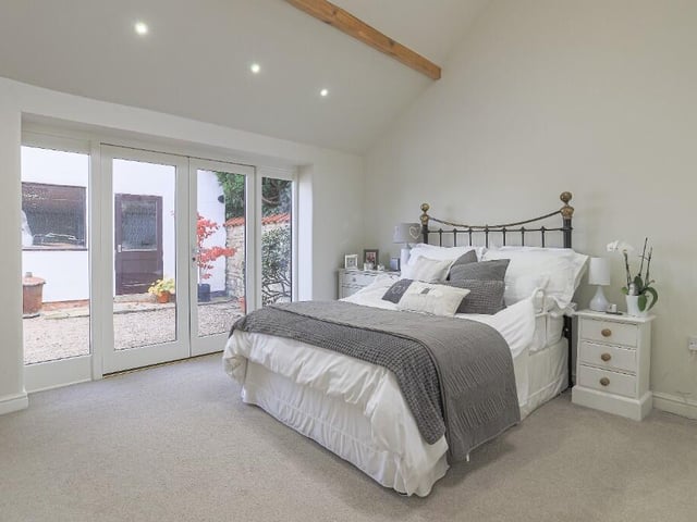 The property has four spacious double bedrooms, one of which has an en suite and dressing room.