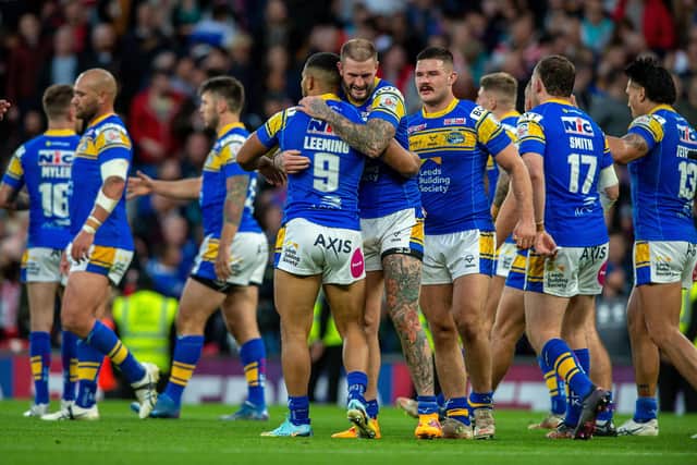 Kruise Leeming is congratulated by Zak Hardaker as Rhinos celebrate his Grand Final try. Picture by Bruce Rollinson.