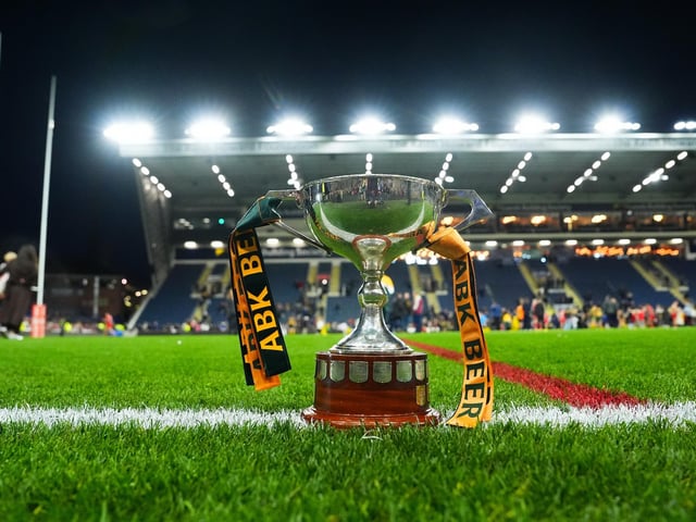 Which three Rhinos players featured for England in the Ashes Test series against Australia?