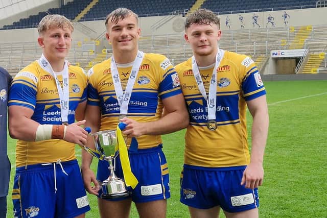 Zak Lloyd, left, seen with Presley Cassell and Oliver Smart following Leeds Rhinos' win against Warrington Wolves in the 2025 reserves Grand Final. Picture by Peter Smith.