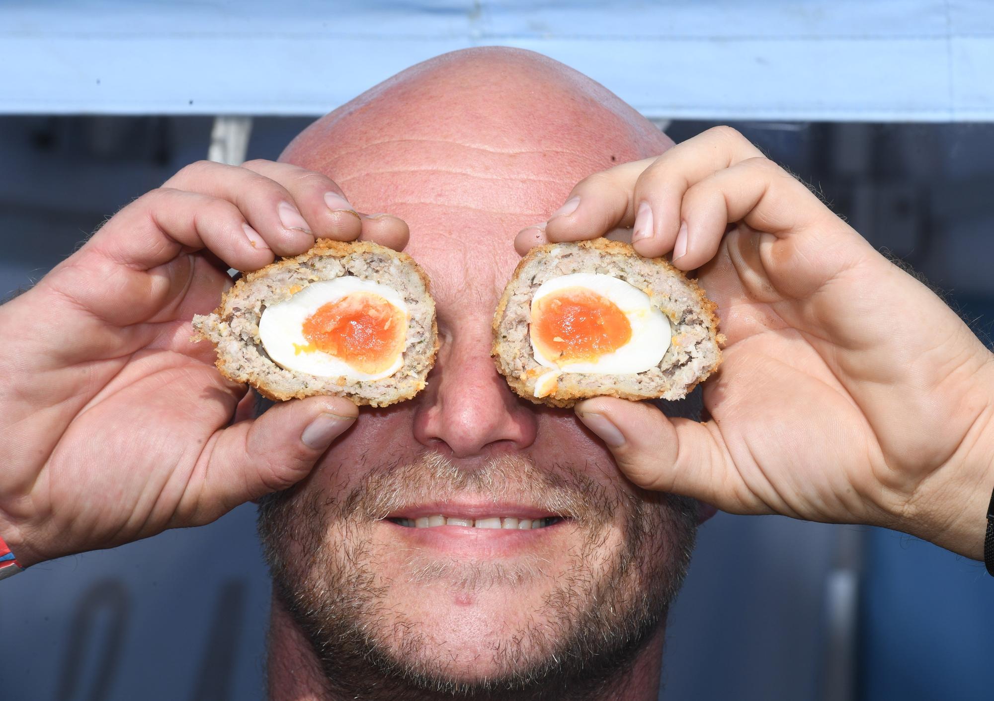 Harrogate Food and Drink Festival - Andrew Harvey, who runs Cassies Vintage Kitchen, demonstrates the art of handling scotch eggs! (Picture Gerard Binks)