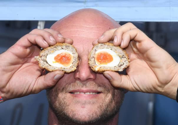 Harrogate Food and Drink Festival - Andrew Harvey, who runs Cassies Vintage Kitchen, demonstrates the art of handling scotch eggs! (Picture Gerard Binks)