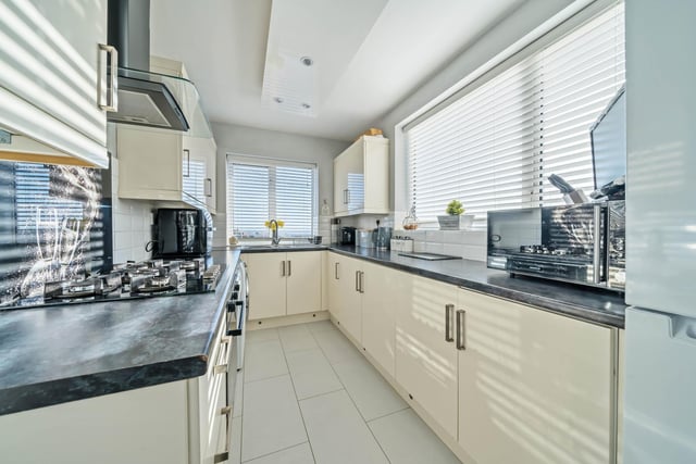 Enter from the side porch and you proceed to the kitchen, which features lots of base units, storage and integrated appliances. The picture windows allows you to enjoy fabulous views of Horsforth.