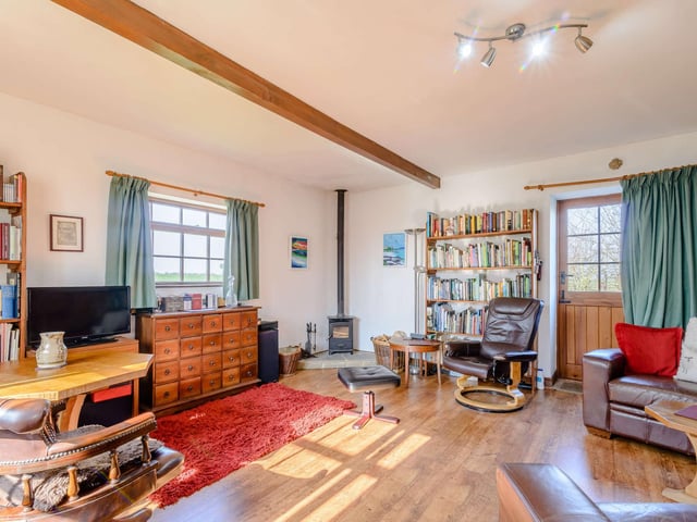 A library, or study, in a room that could suit a variety of uses.