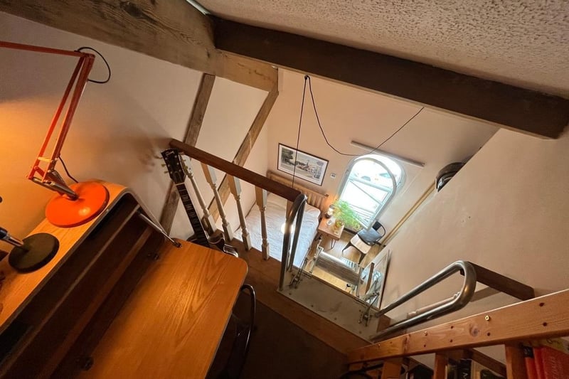 From the bedroom there is access to a mezzanine study area via a pull down ladder.