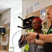 Tutor with learner on an Aim2Learn course at their Sugar Mill centre, Leeds